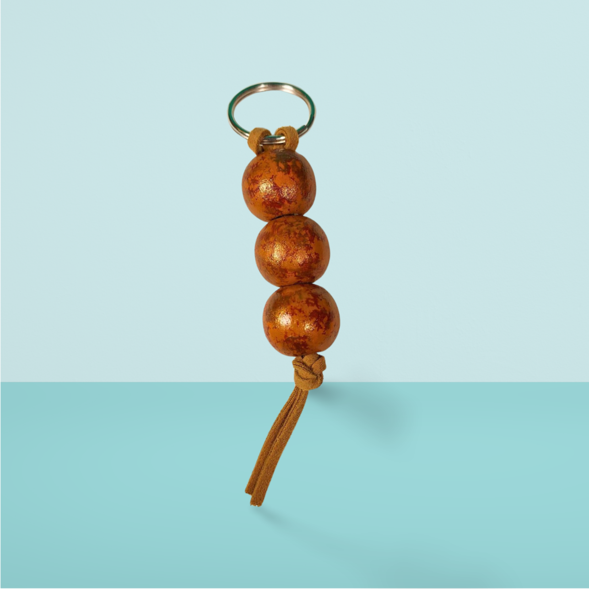 Tan and Bronze Hand Painted Wooden Fidget Keychain