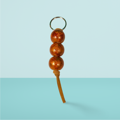 Tan and Bronze Hand Painted Wooden Fidget Keychain